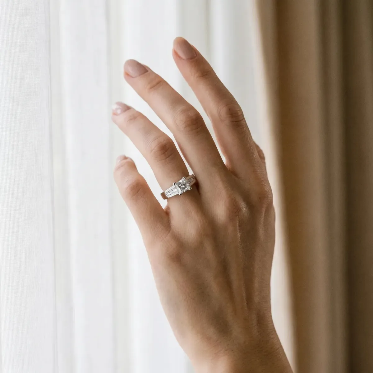 Asscher Cut Cut Channel Set Solitaire Ring with Four-Prong Setting Platinum