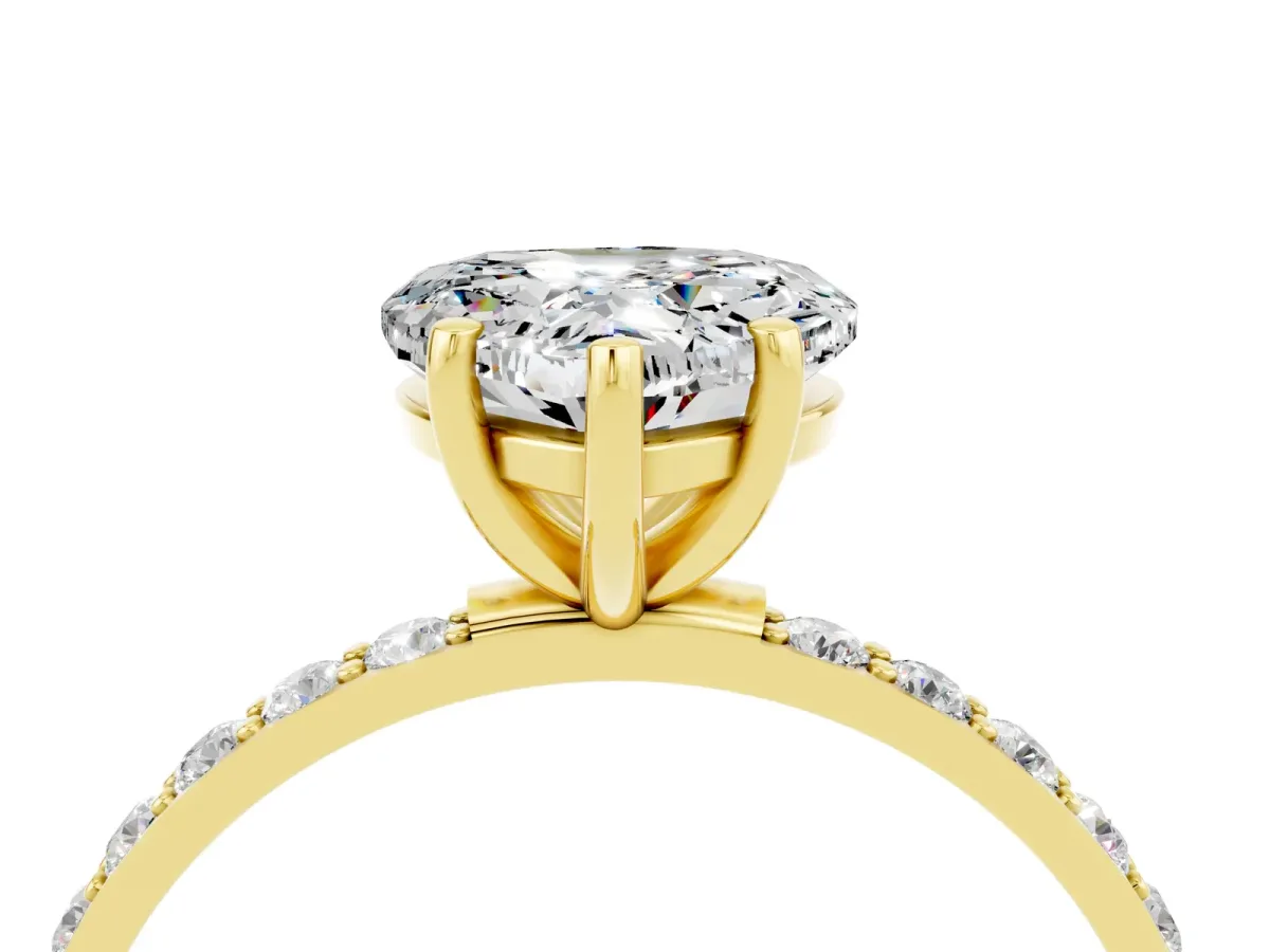 Heart Cut Moissanite Solitaire Ring with Round Pavé Band and Prong Setting Yellow gold