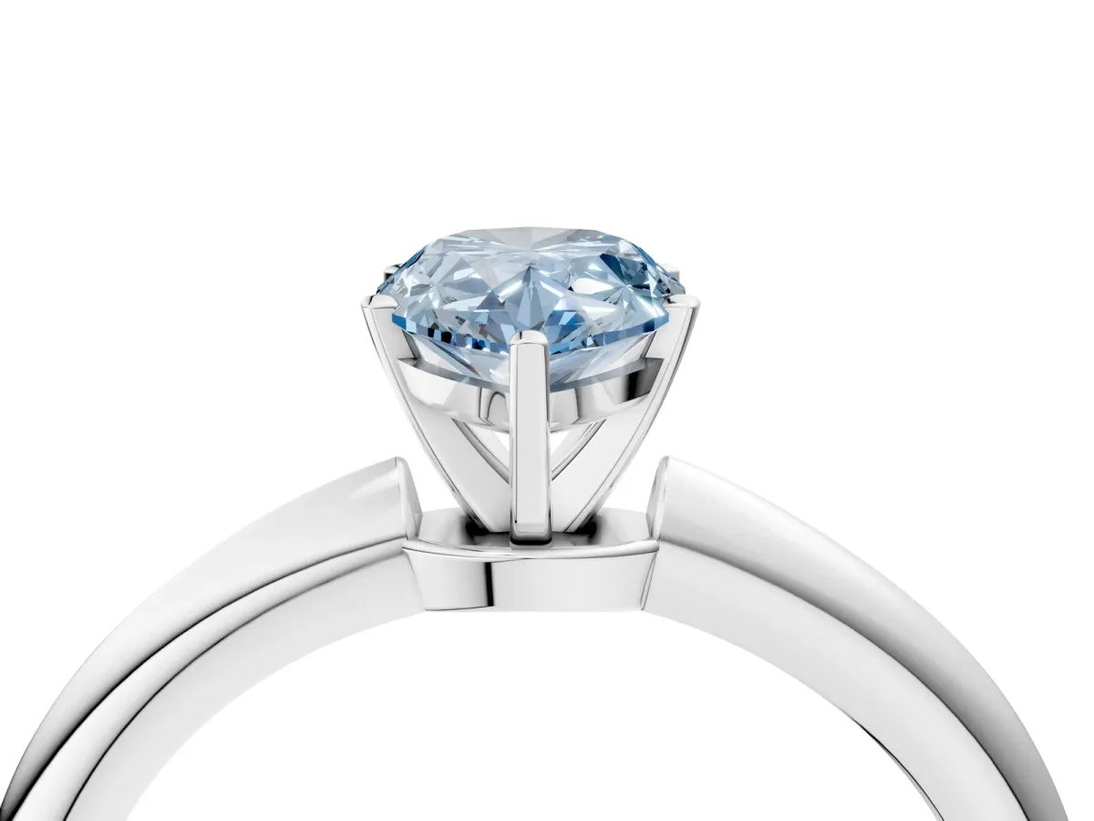 Fancy Blue Pear Cut Diamond Solitaire Ring with Six-Prong Setting and Classic Band Platinum
