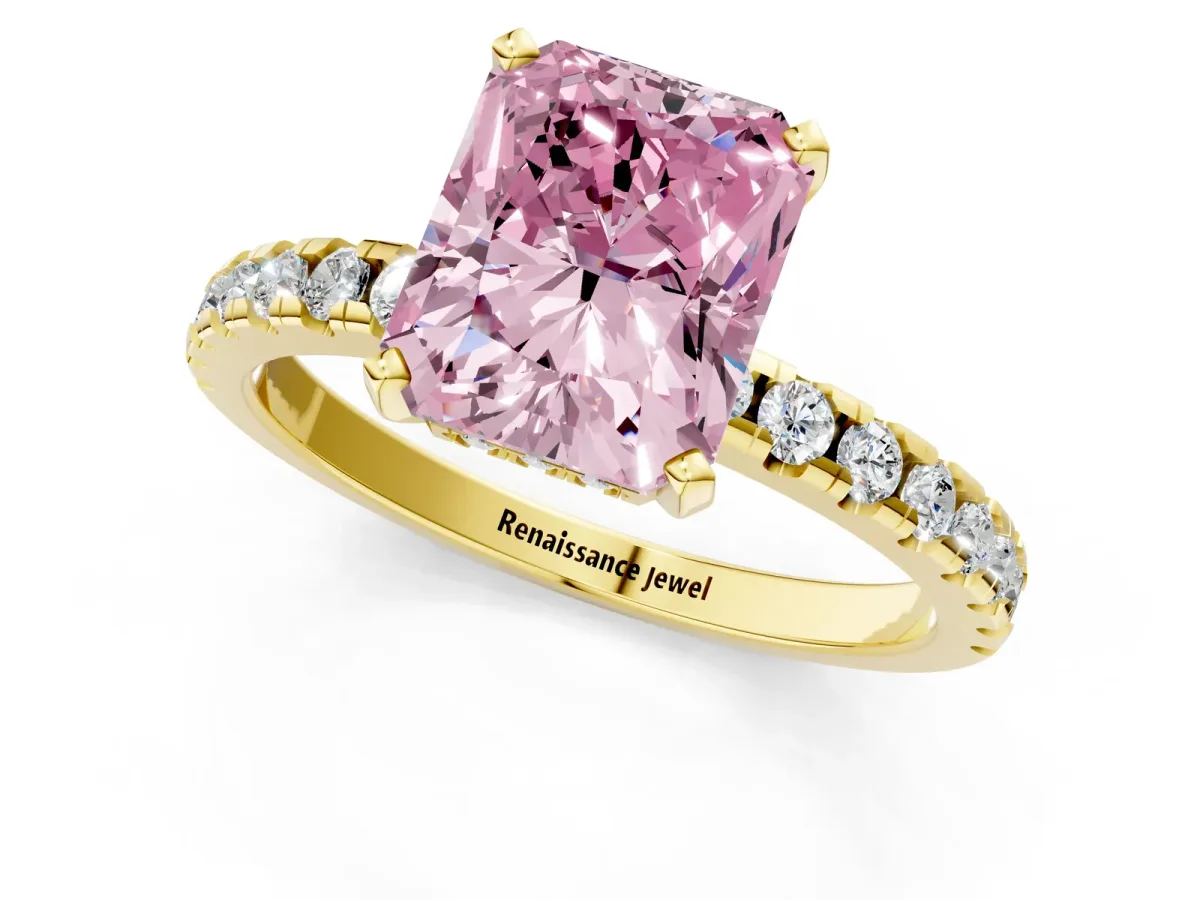 Fancy Pink Radiant Cut Diamond Solitaire Ring with Round Pavé Band and Four-Prong Setting Yellow gold