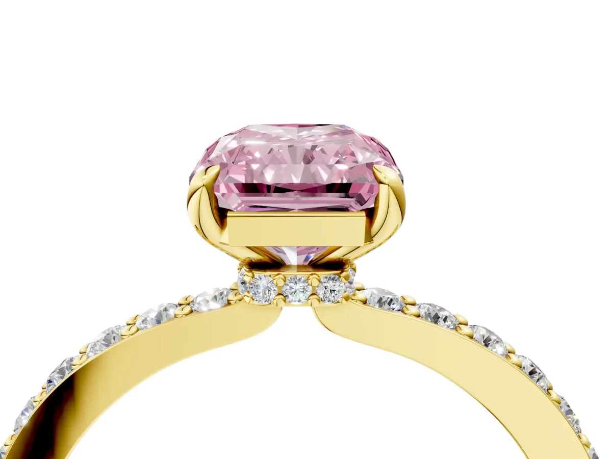 Fancy Pink Radiant Cut Diamond Solitaire Engagement Ring with Pavé Band and Four-Prong Setting Yellow gold