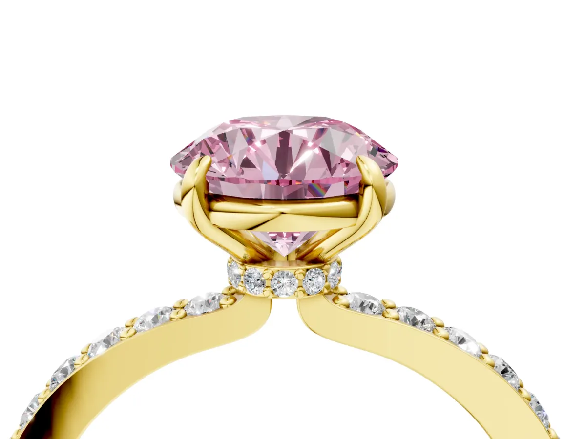 Fancy Pink Round Cut Diamond Solitaire Engagement Ring with Pavé Band and Four-Prong Setting Yellow gold