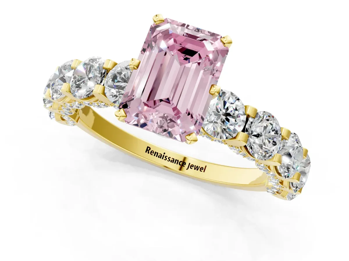 Fancy Pink Emerald Cut Diamond Side Stone Engagement Ring with Four-Prong Setting Yellow gold