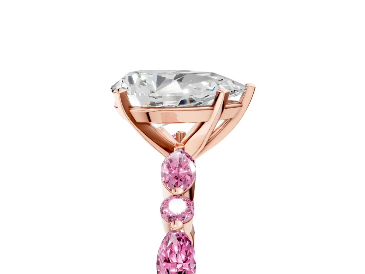 Pear Cut Diamond Ring with Marquise and Round Pink Sapphire Side Stones and Four-Prong Setting Rose gold