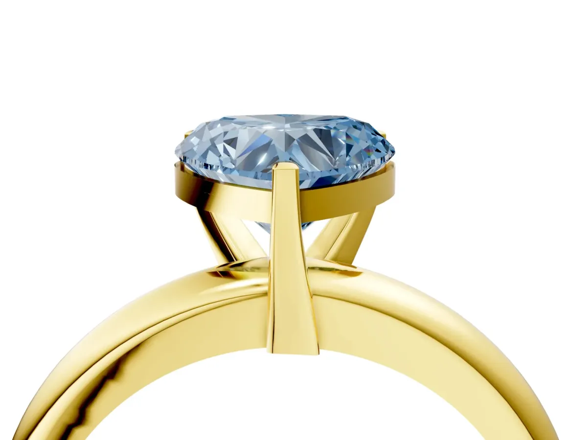 Fancy Blue Heart Cut Diamond Solitaire Engagement Ring with Round Band and Four-Prong Setting Yellow gold