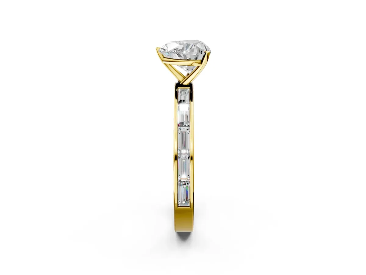 Heart Cut Solitaire Diamond Ring with Channel-Set Baguette Band and Four-Prong Setting Yellow gold