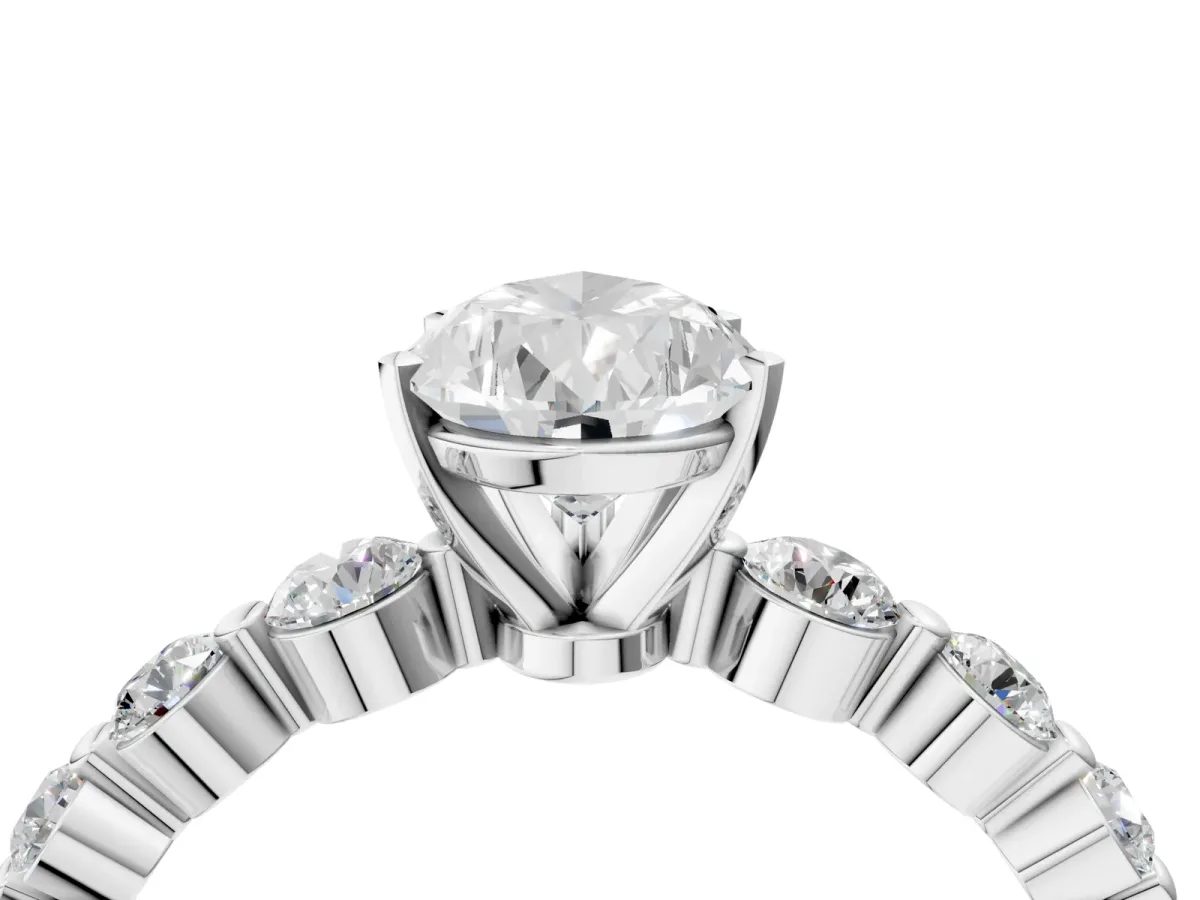 Pear Cut Solitaire Diamond Ring with Pave Band and Four-Prong Setting Platinum