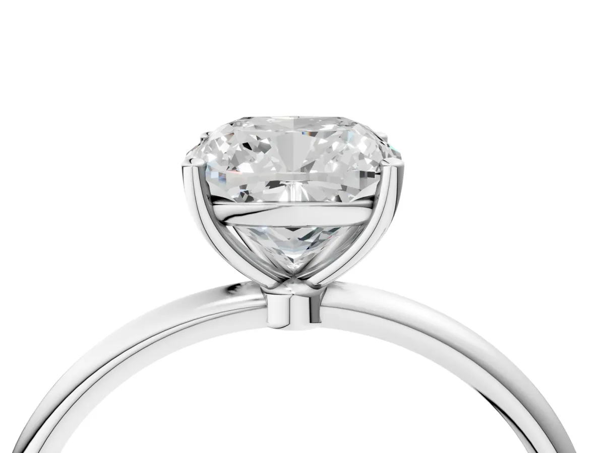 Cushion Cut Cut Solitaire Engagement Ring with Thin Band and Four-Prong Setting Silver