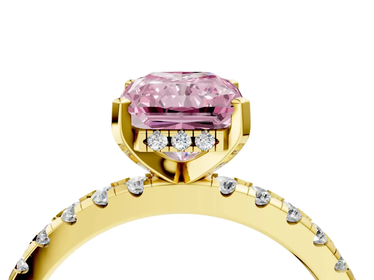 Fancy Pink Radiant Cut Diamond Solitaire Ring with Round Pavé Band and Four-Prong Setting Yellow gold
