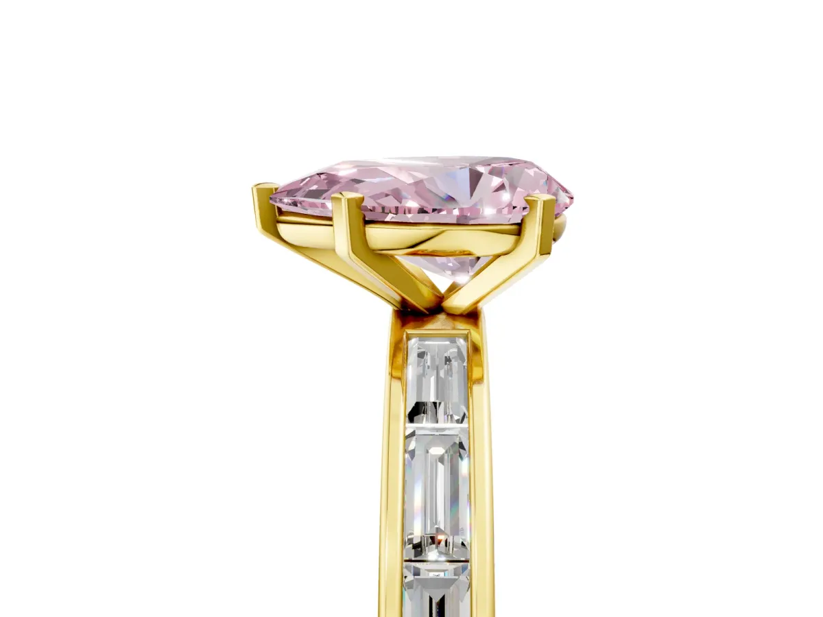 Fancy Pink Pear Cut Solitaire Diamond Ring with Channel-Set Baguette Band and Four-Prong Setting Yellow gold