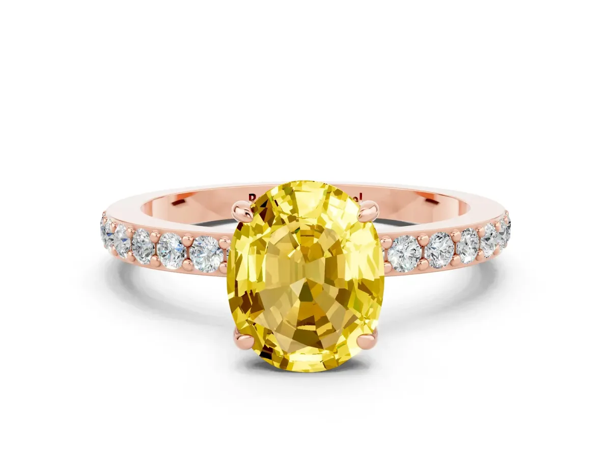 Oval Cut Yellow Sapphire Solitaire Engagement Ring with Pavé Band and Four-Prong Setting Rose gold