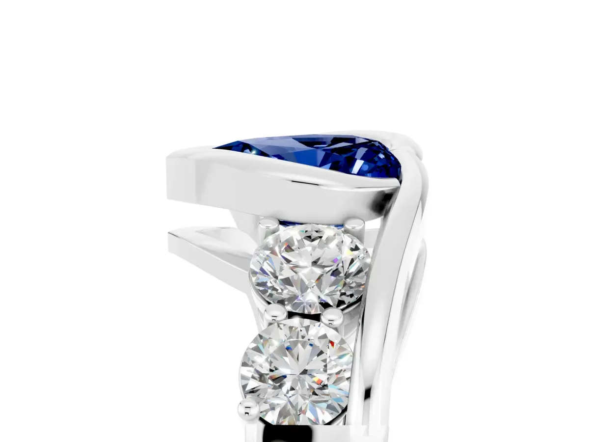 Bezel Set Heart Cut Blue Sapphire Bypass Ring with Round Accents Platinum