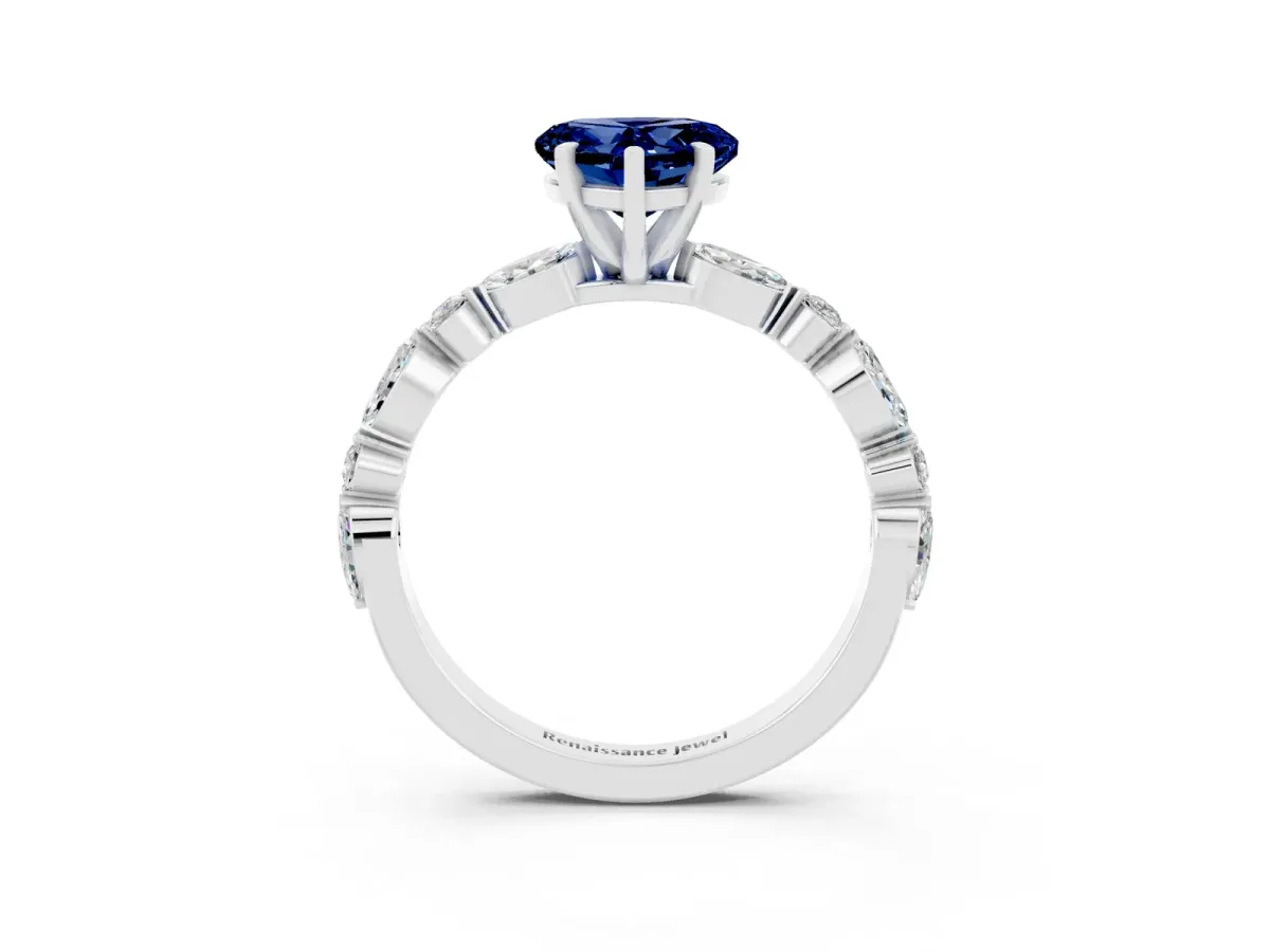 Heart Cut Blue Sapphire Ring with Marquise and Round Side Stones and Four-Prong Setting White gold