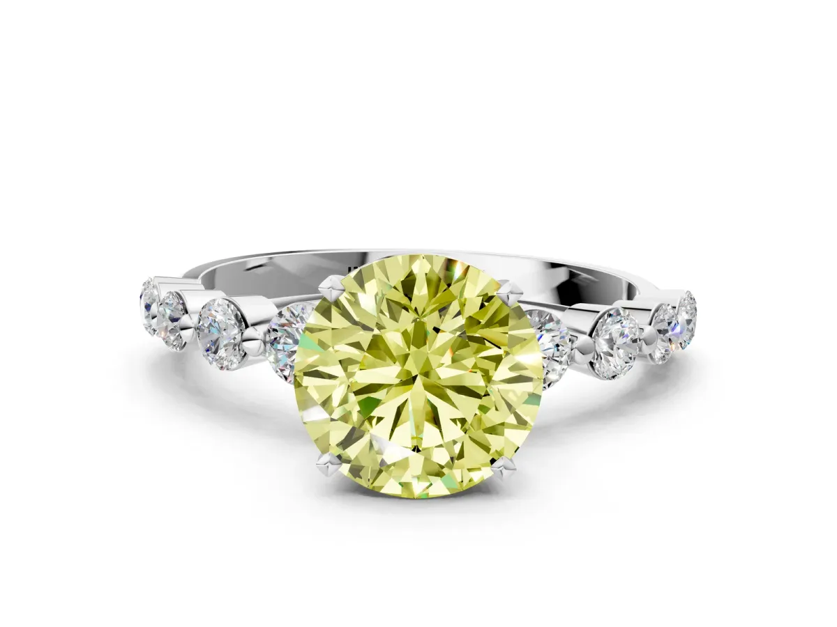 Fancy Yellow Round Cut Solitaire Diamond Ring with Pave Band and Four-Prong Setting Silver