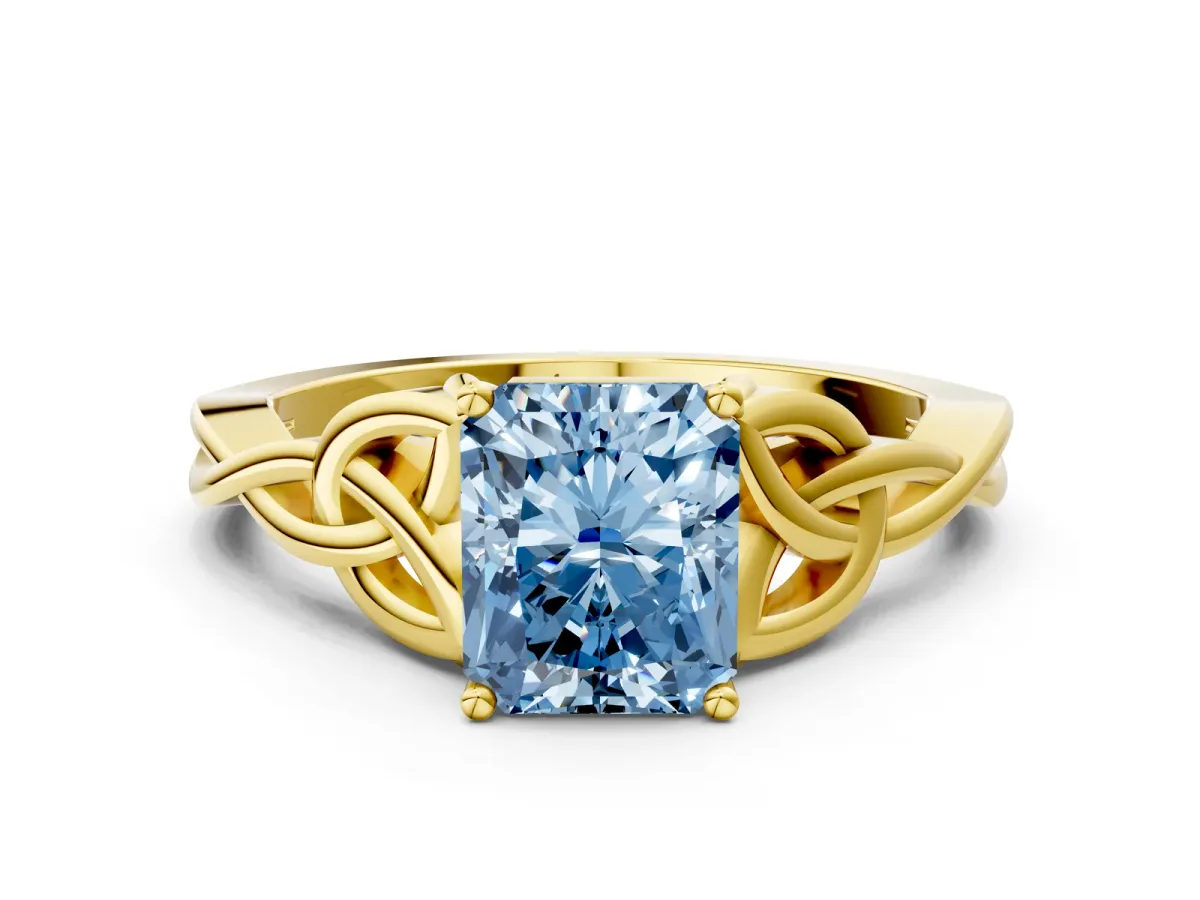 Fancy Blue Radiant Cut Diamond Solitaire Engagement Ring with Celtic Knot Band and Four-Prong Setting Yellow gold