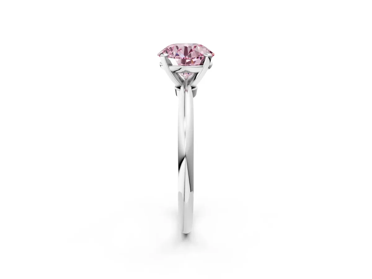 Fancy Pink Round Cut Diamond Solitaire Ring with Six-Prong Setting and Classic Band Silver