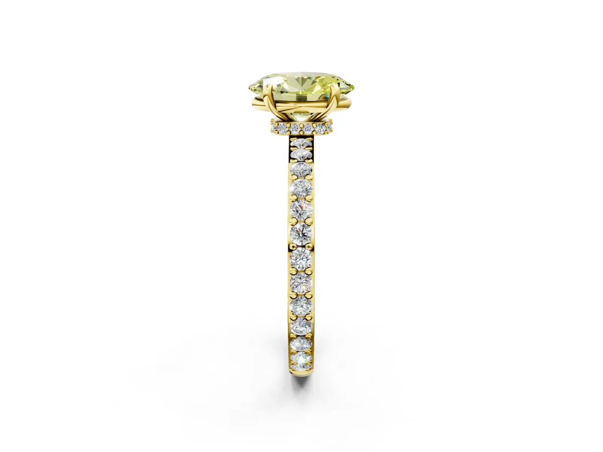 Fancy Yellow Oval Cut Diamond Solitaire Engagement Ring with Pavé Band and Four-Prong Setting Yellow gold