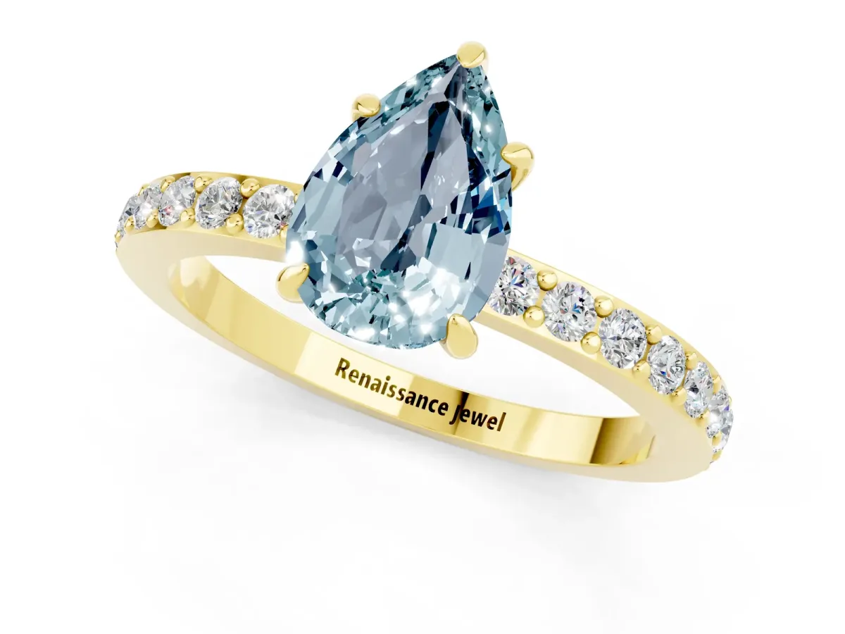Pear Cut Aquamarine Solitaire Engagement Ring with Pavé Band and Four-Prong Setting Yellow gold