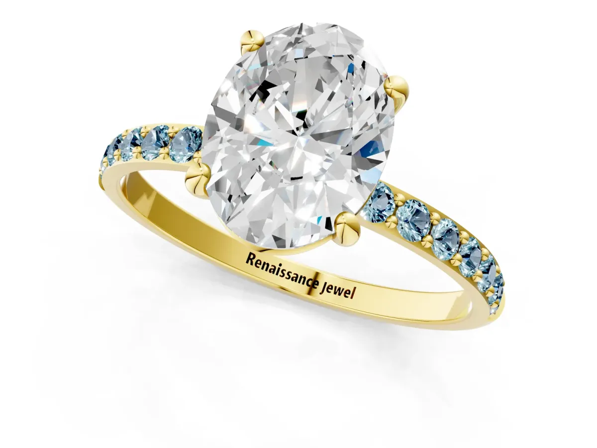 Oval Cut Diamond Solitaire Ring with Round Aquamarine Pavé Band and Prong Setting Yellow gold