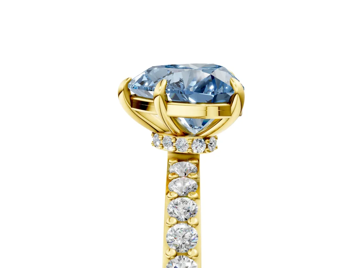 Fancy Blue Heart Cut Diamond Solitaire Engagement Ring with Pavé Band and Four-Prong Setting Yellow gold