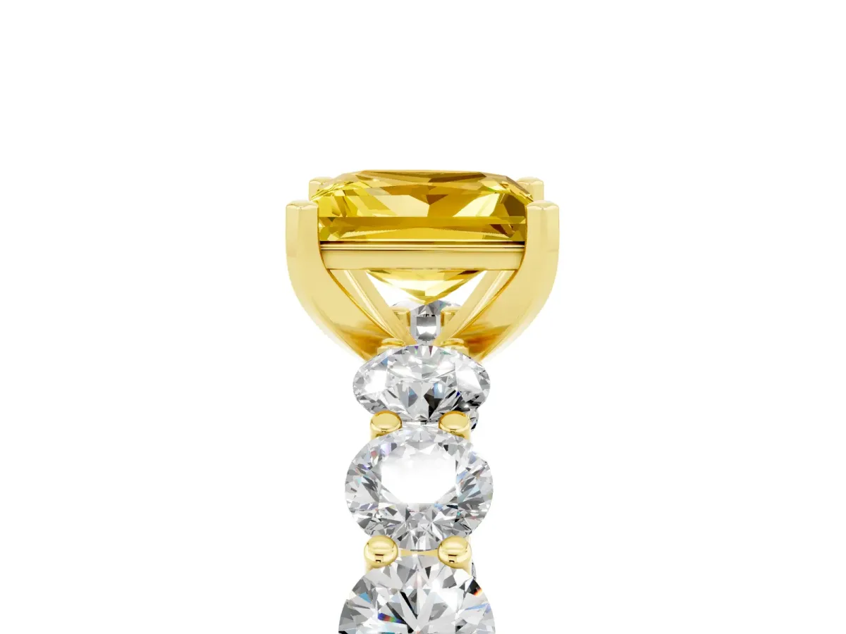 Princess Cut Yellow Sapphire Prong Setting with Side Stones on a Pave Band Yellow gold