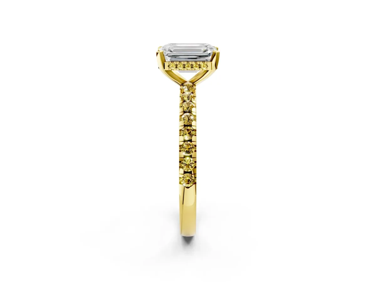 Emerald Cut Diamond Solitaire Ring with Round Yellow Sapphire Pavé Band and Four-Prong Setting Yellow gold