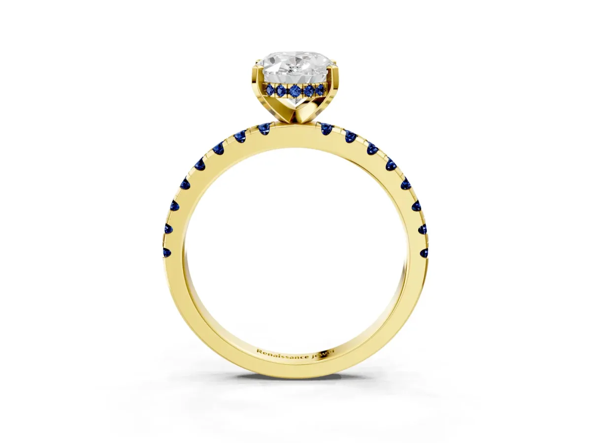 Oval Cut Diamond Solitaire Ring with Round Blue Sapphire Pavé Band and Four-Prong Setting Yellow gold