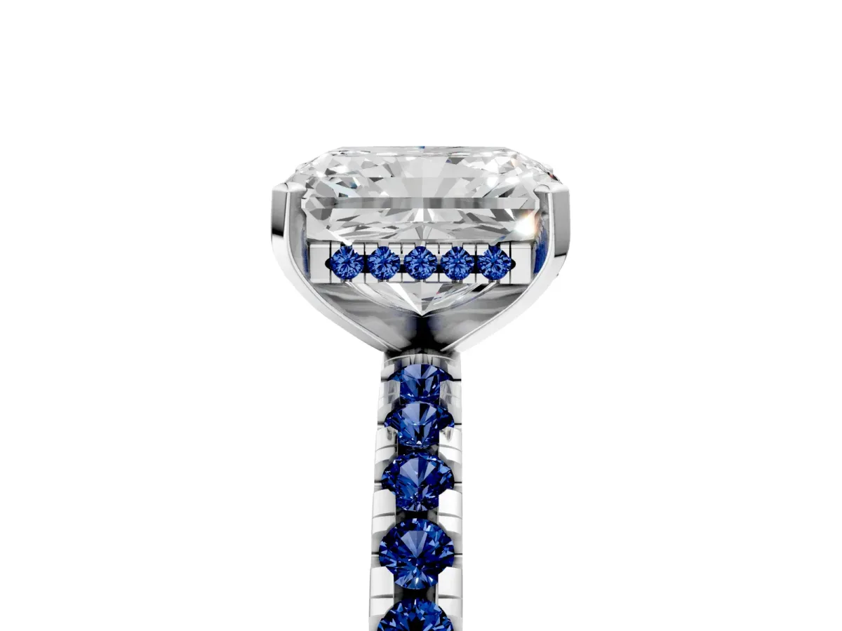 Radiant Cut Diamond Solitaire Ring with Round Blue Sapphire Pavé Band and Four-Prong Setting White gold