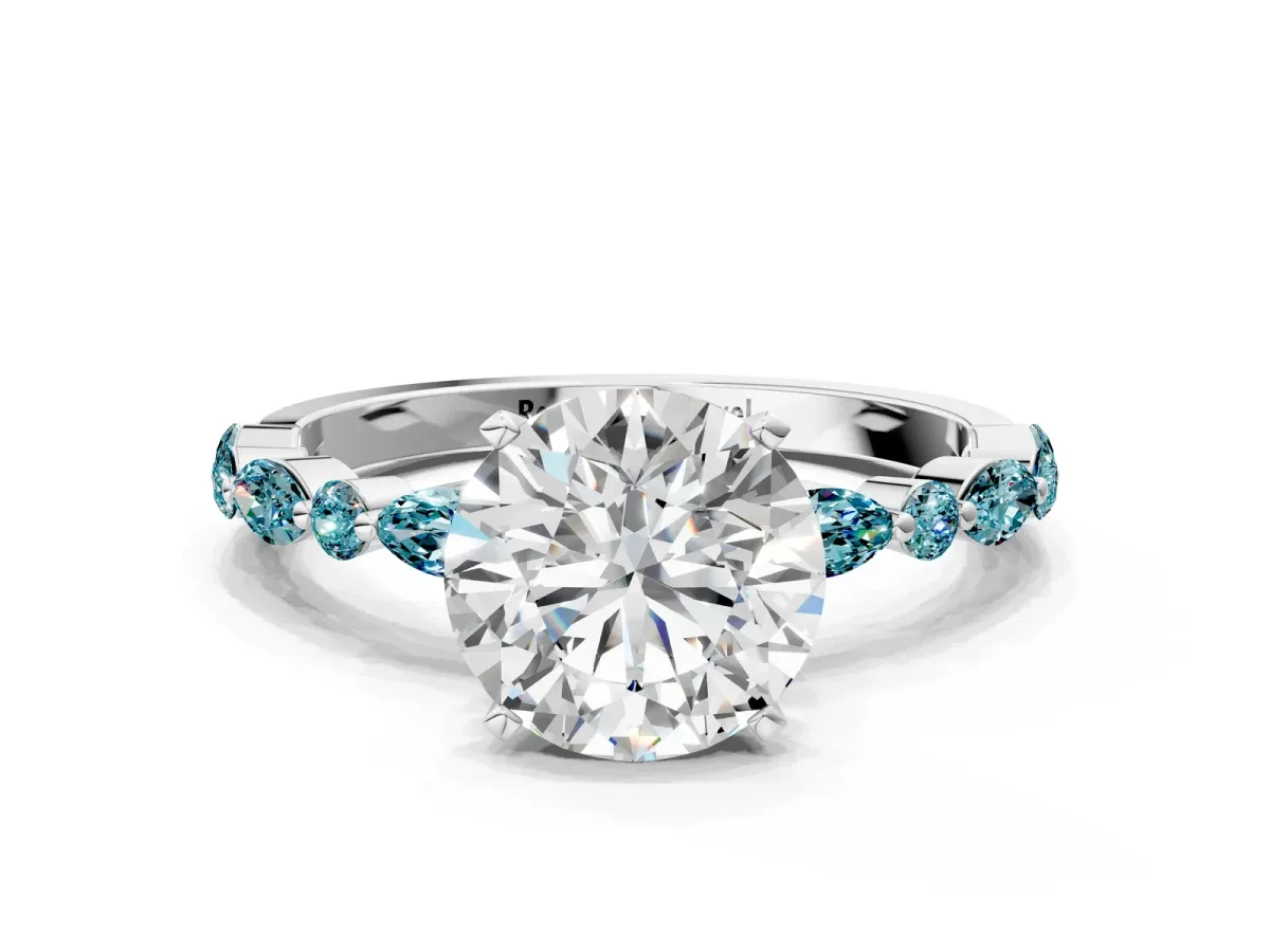 Round Cut Diamond Ring with Marquise and Round Blue Topaz Side Stones and Four-Prong Setting White gold