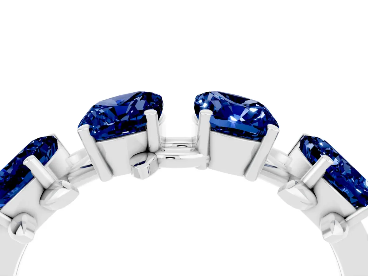 Four-Stone Elongated Cushion Blue Sapphire Band with Nature-Inspired Prong Setting White gold