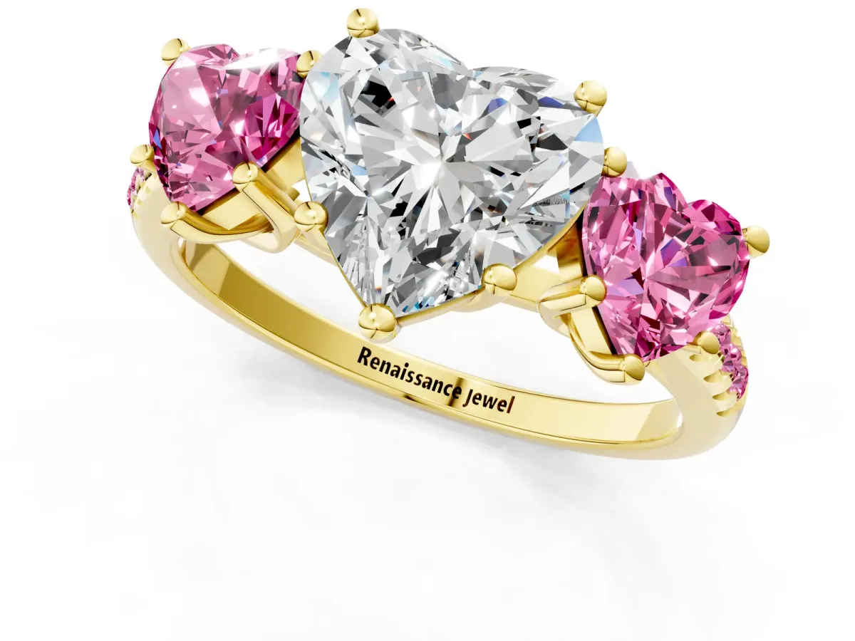 Three-Stone Heart Cut Diamond Ring with Round Pink Sapphire Pavé Band and Prong Setting Yellow gold