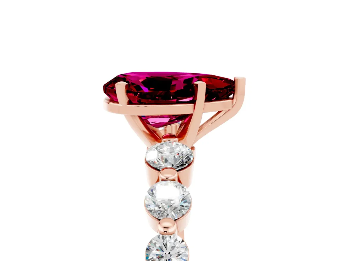 Pear Cut Solitaire Garnet Ring with Pave Band and Four-Prong Setting Rose gold