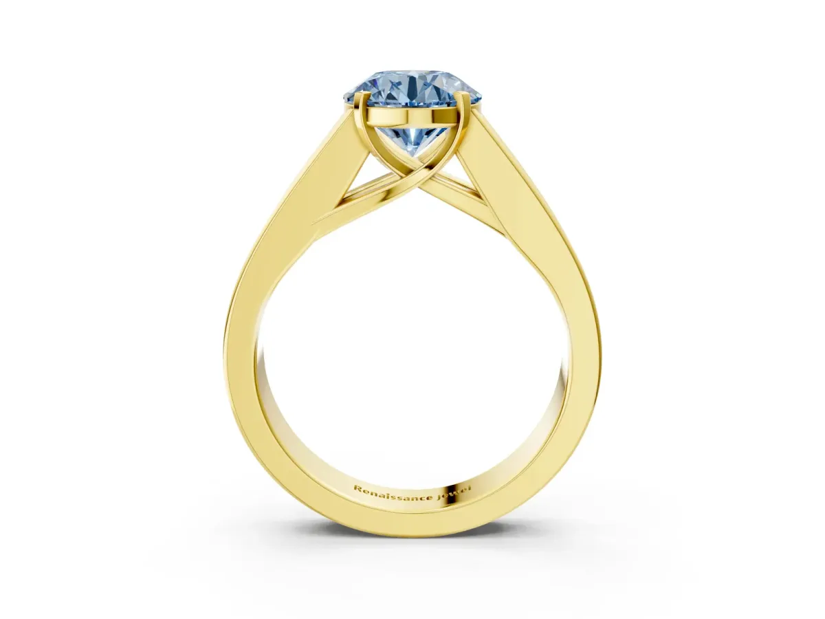 Fancy Blue Round Cut Cut Channel Set Solitaire Ring with Four-Prong Setting Yellow gold