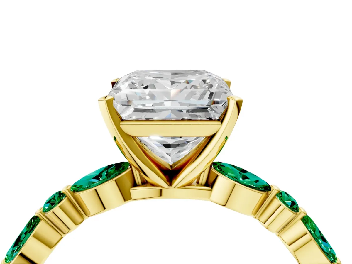 Princess Cut Diamond Ring with Marquise and Round Emerald Side Stones and Four-Prong Setting Yellow gold