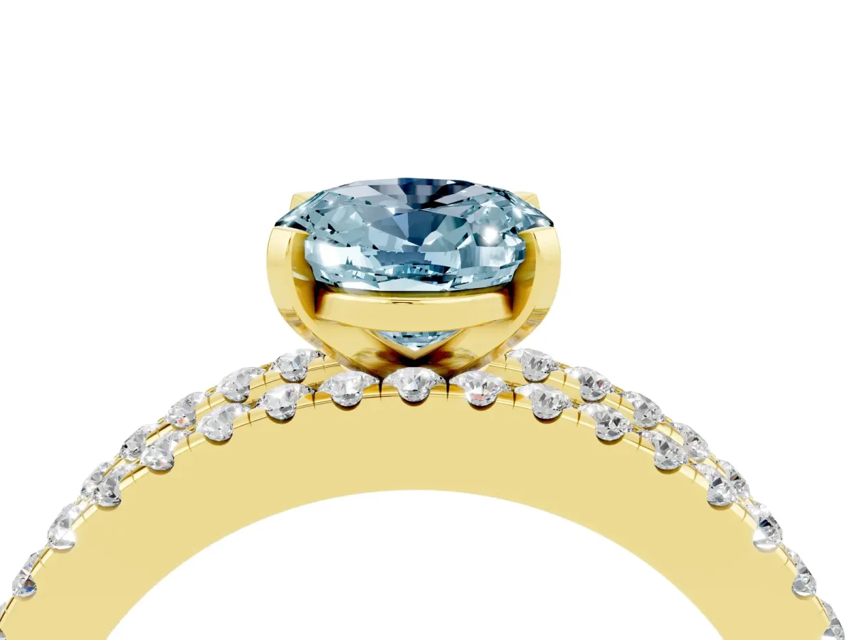 Oval Cut Aquamarine Solitaire Ring with Pavé and Channel Set Band Yellow gold