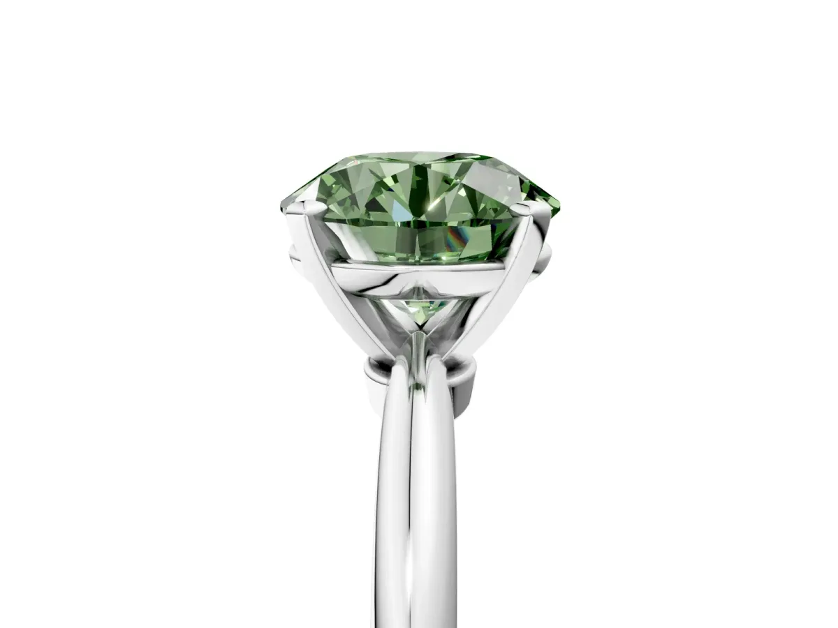 Fancy Green Round Cut Diamond Solitaire Ring with Six-Prong Setting and Classic Band Silver