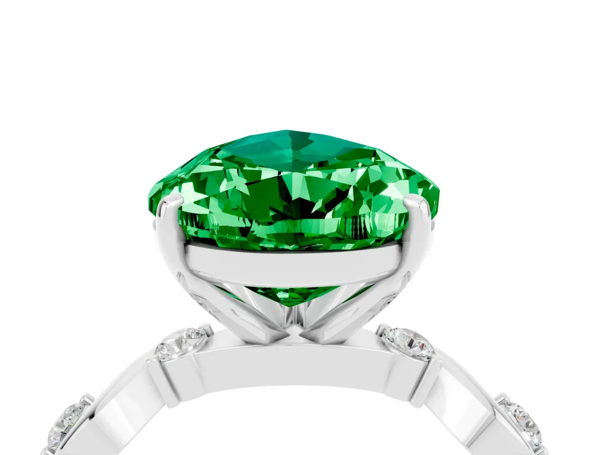 Pear Cut Emerald Solitaire Twisted Band with Round Accents and Prong Setting Silver