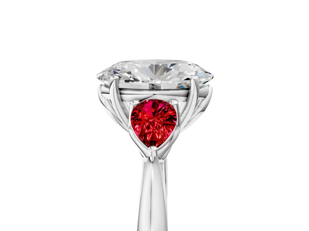 Oval Cut Diamond Three-Stone Ring with Pear Ruby Side Stones and Prong Setting White gold