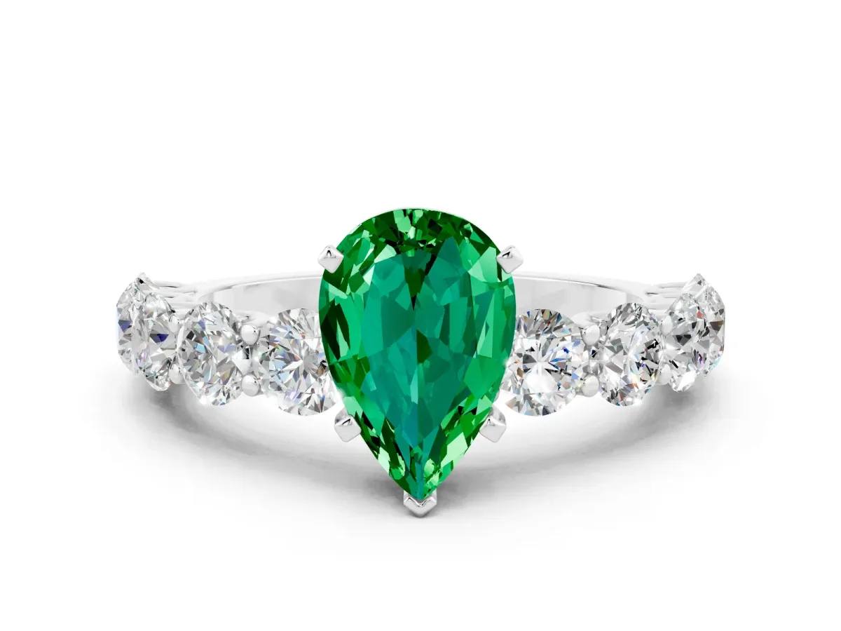 Pear Cut Emerald Prong Setting with Side Stones on a Pave Band Platinum