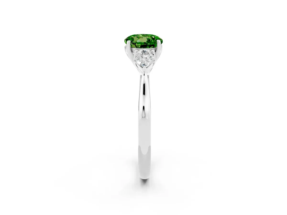 Three-Stone Round Cut Peridot Ring with Pear Side Stones in Four-Prong Setting Platinum