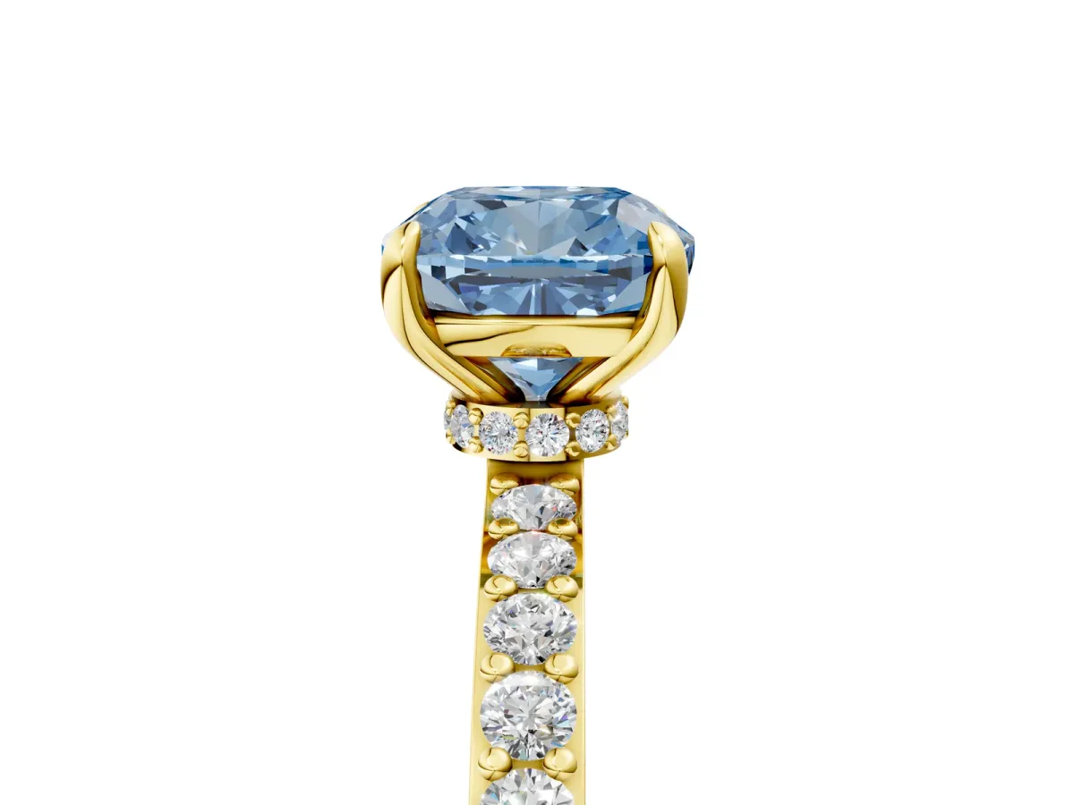 Fancy Blue Cushion Cut Diamond Solitaire Engagement Ring with Pavé Band and Four-Prong Setting Yellow gold