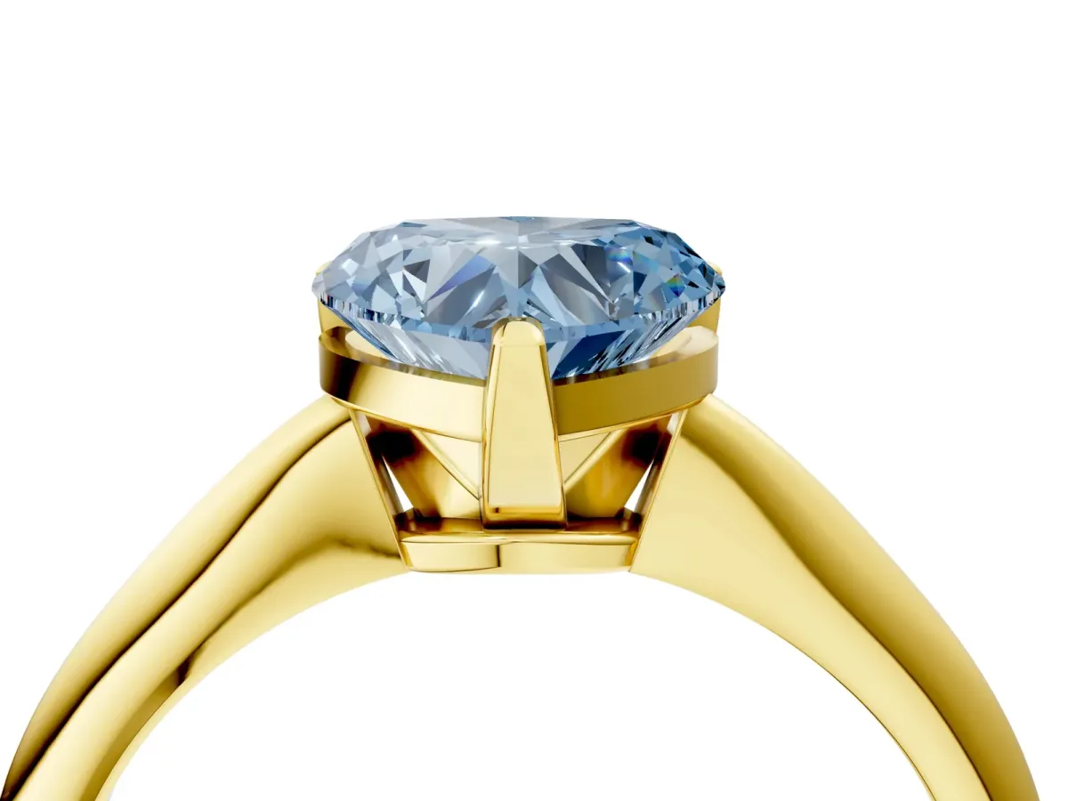 Fancy Blue Heart Cut Diamond Solitaire Engagement Ring with Classic Band and Four-Prong Setting Yellow gold