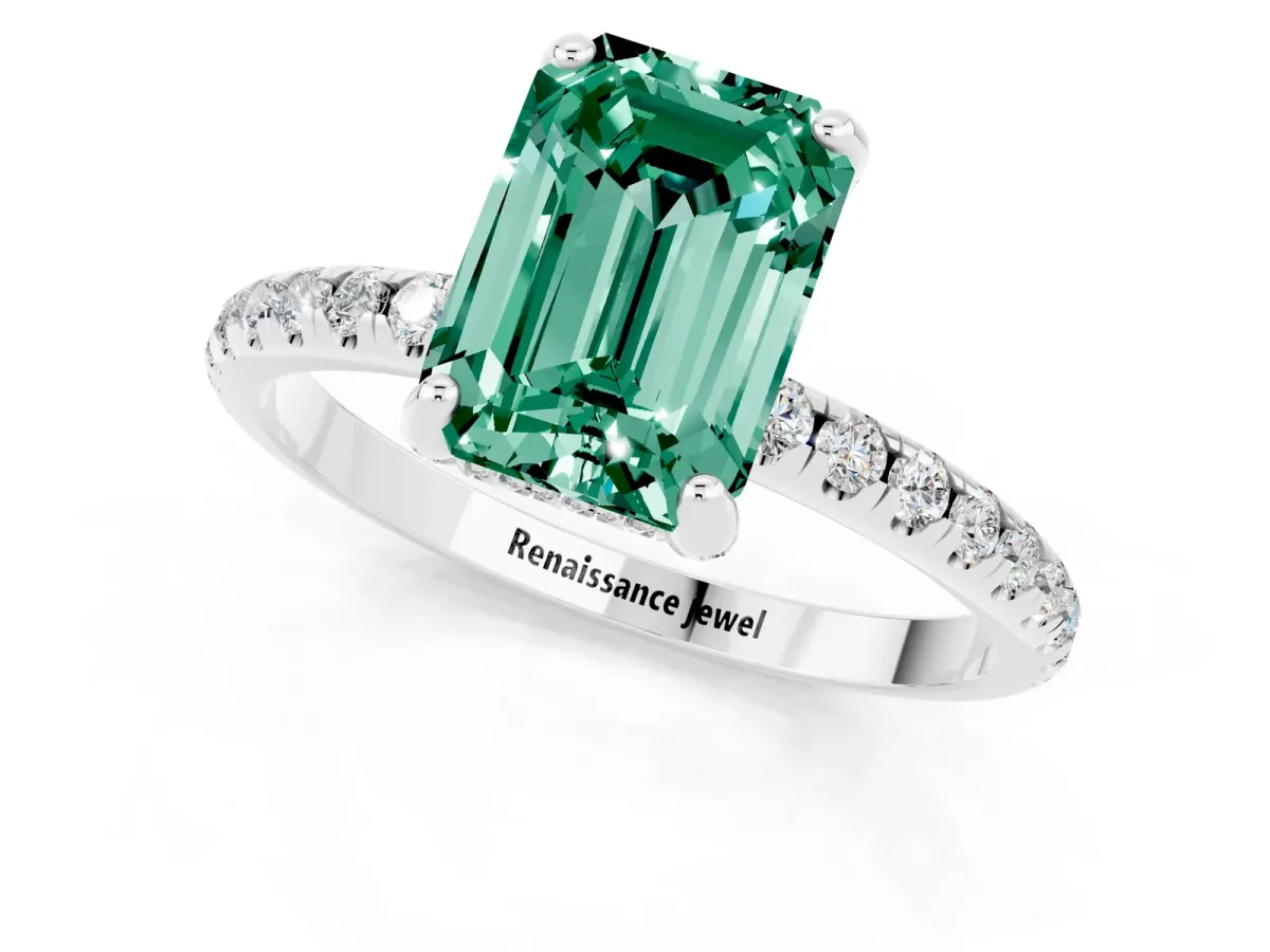 Emerald Cut Green Sapphire Hidden Halo Engagement Ring with Round Pavé Band and Prong Setting Silver