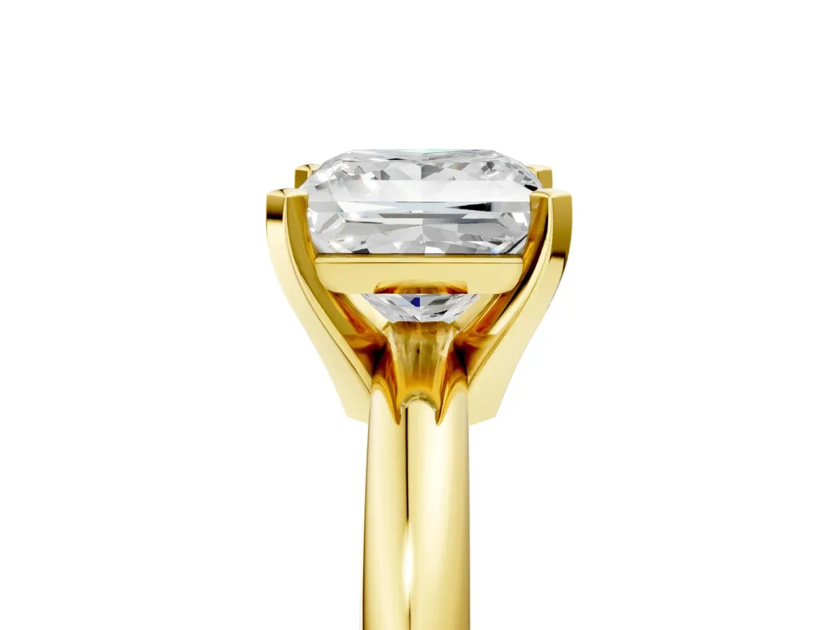 Princess Cut Diamond Solitaire Engagement Ring with Round Band and Four-Prong Setting Yellow gold