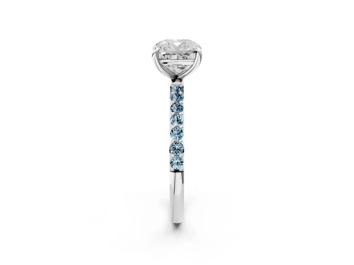 Cushion Cut Diamond Solitaire Ring with Round Aquamarine Pavé Band and Prong Setting White gold