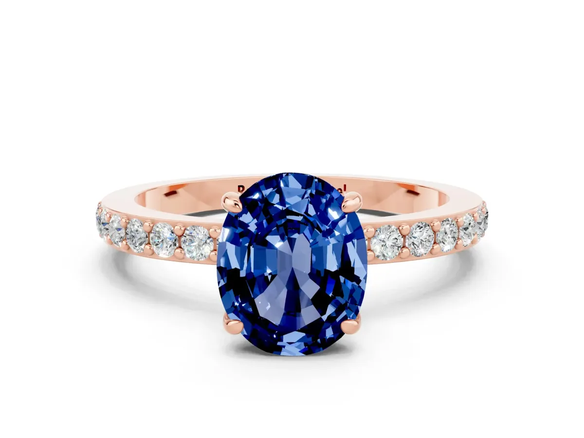 Oval Cut Blue Sapphire Solitaire Engagement Ring with Pavé Band and Four-Prong Setting Rose gold