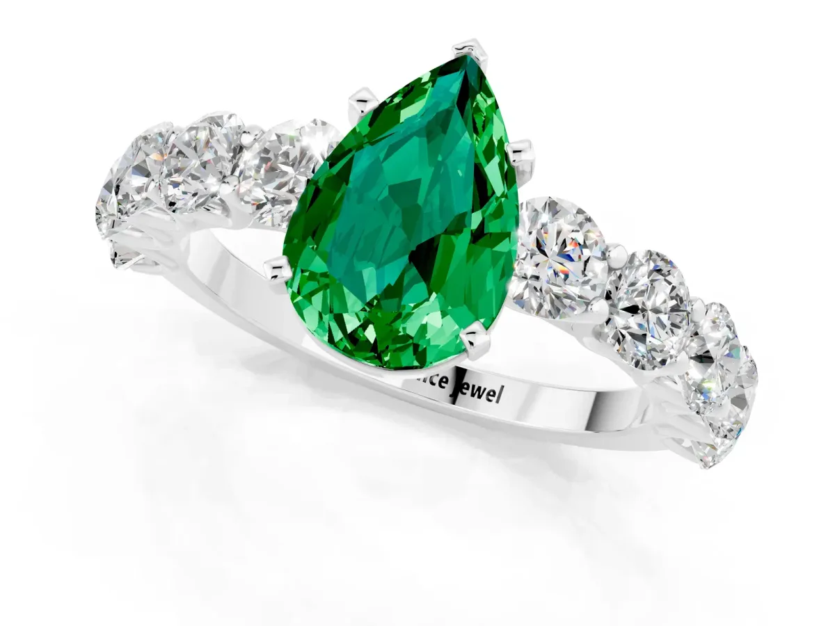 Pear Cut Emerald Prong Setting with Side Stones on a Pave Band Platinum