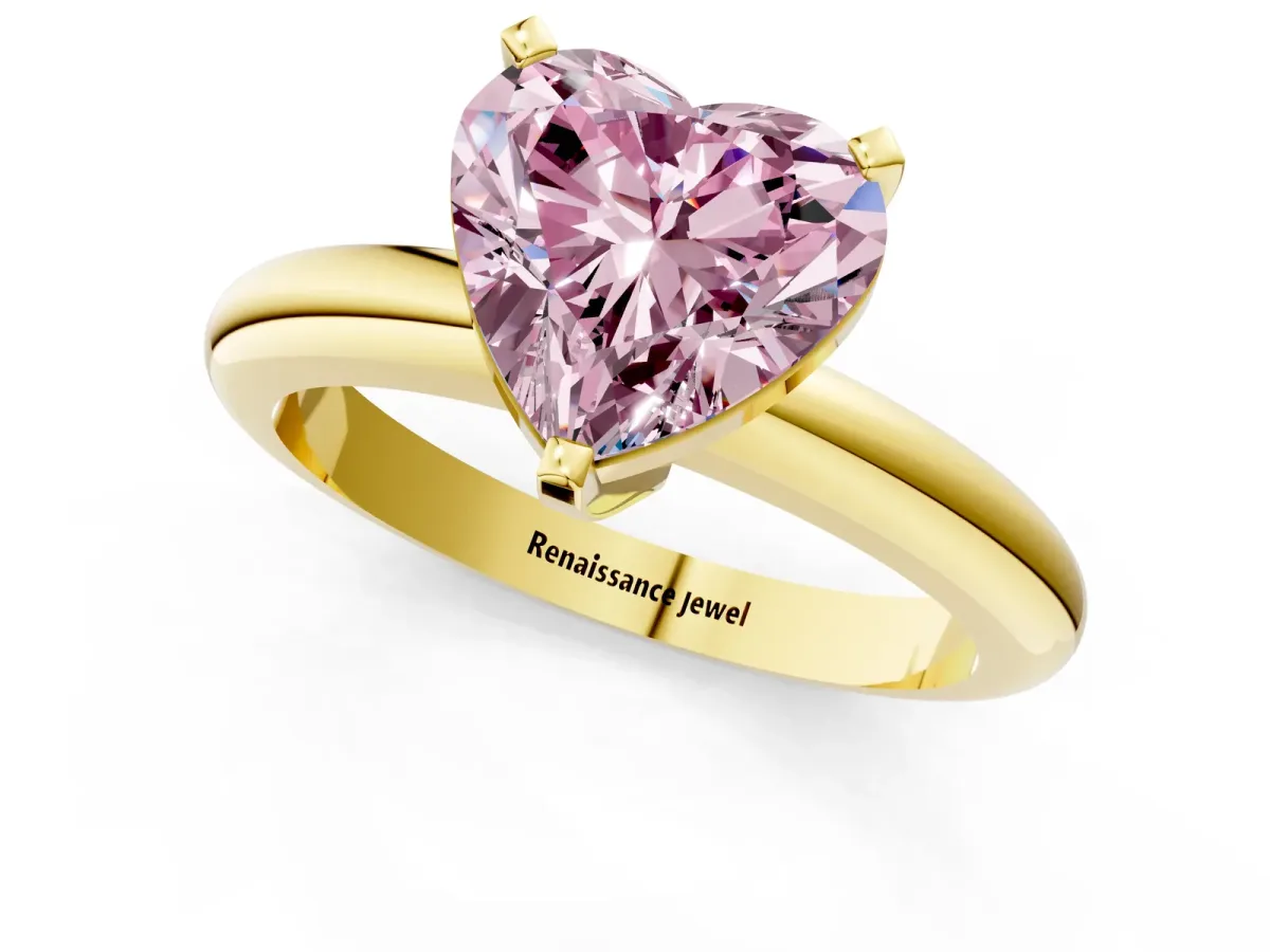 Fancy Pink Heart Cut Diamond Solitaire Engagement Ring with Round Band and Four-Prong Setting Yellow gold