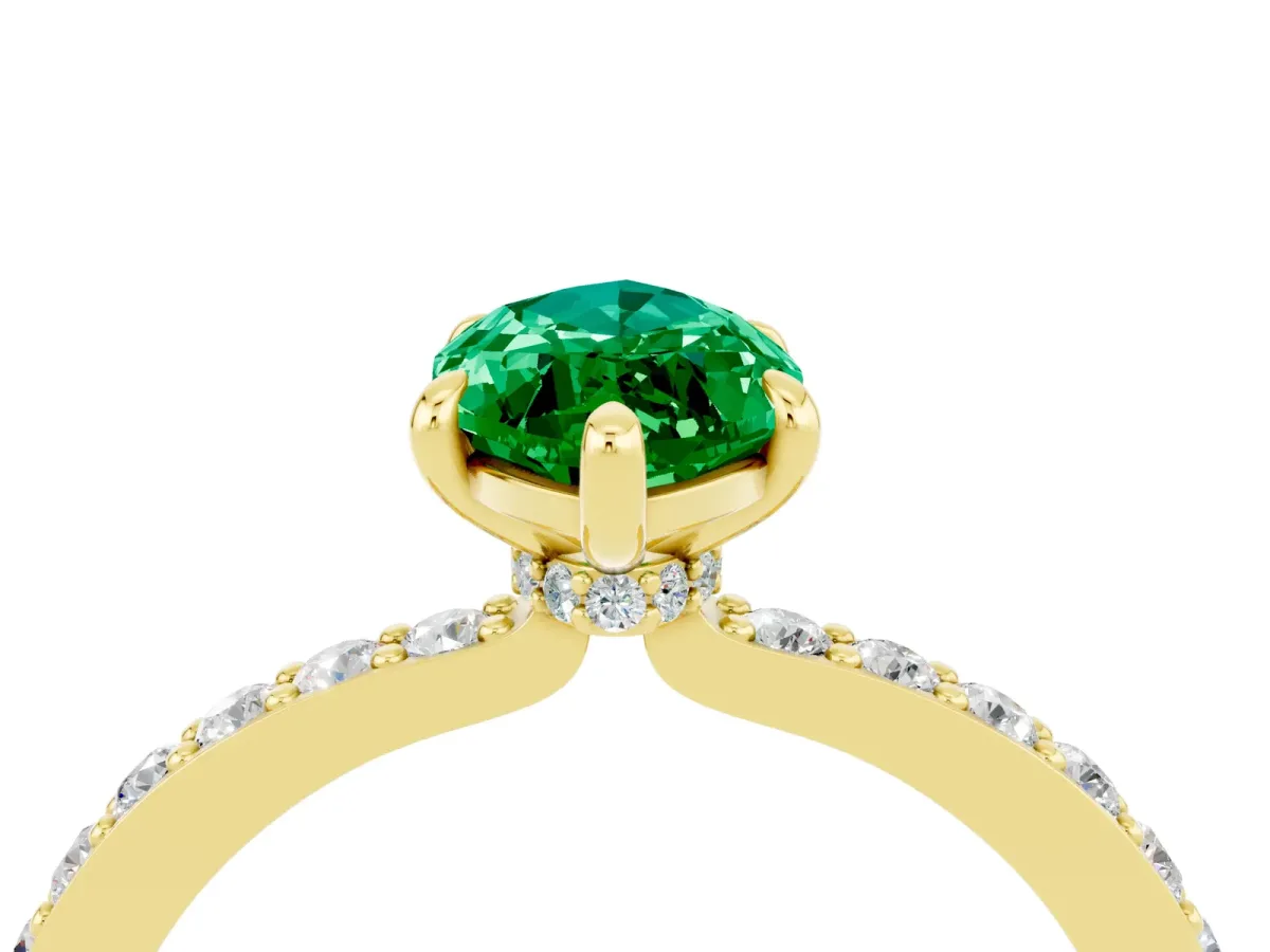 Marquise Cut Emerald Solitaire Engagement Ring with Pavé Band and Four-Prong Setting Yellow gold
