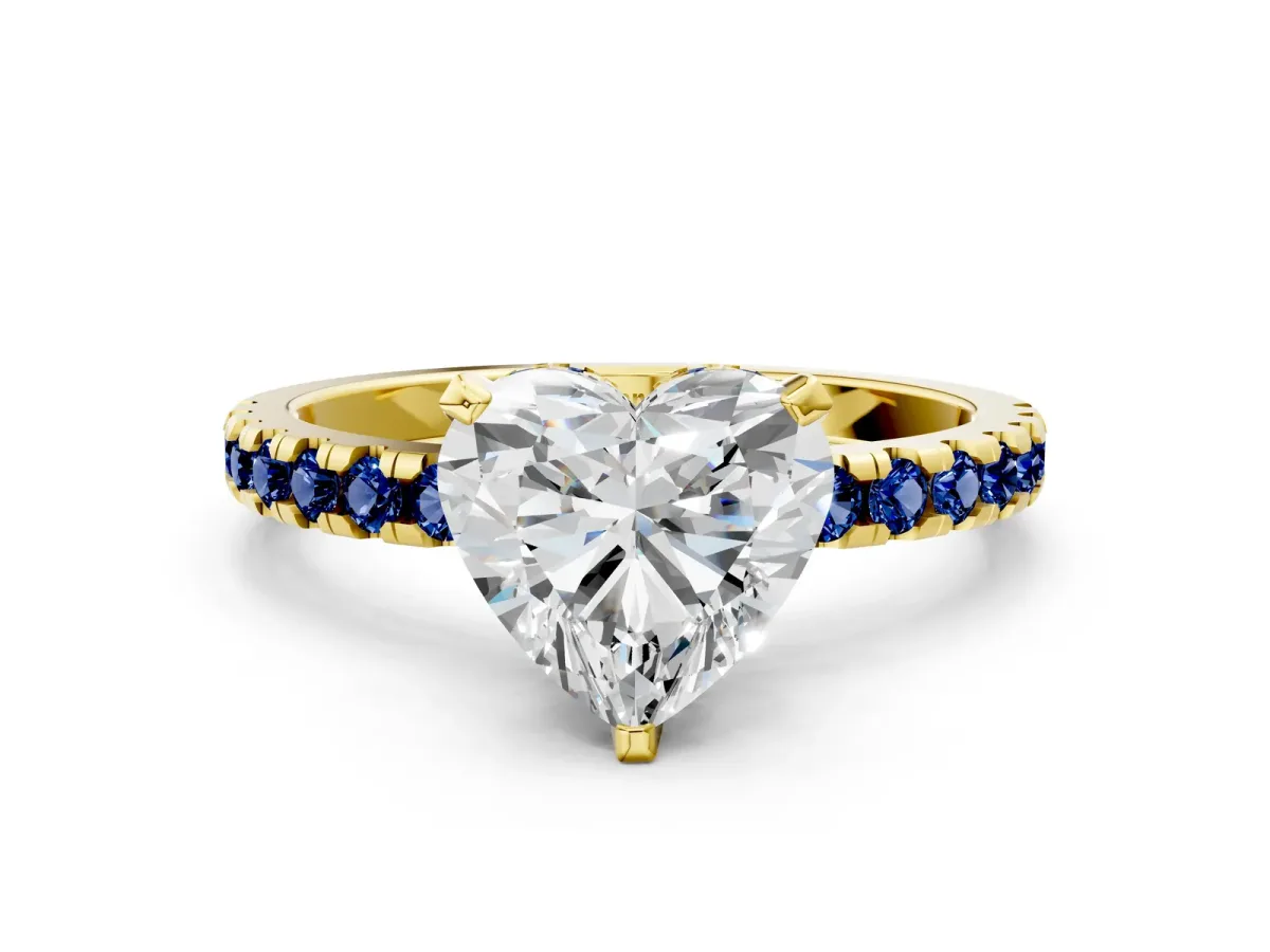 Heart Cut Diamond Solitaire Ring with Round Blue Sapphire Pavé Band and Four-Prong Setting Yellow gold